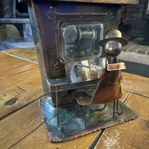 Artistic Metal Sculpture of Man at Desk